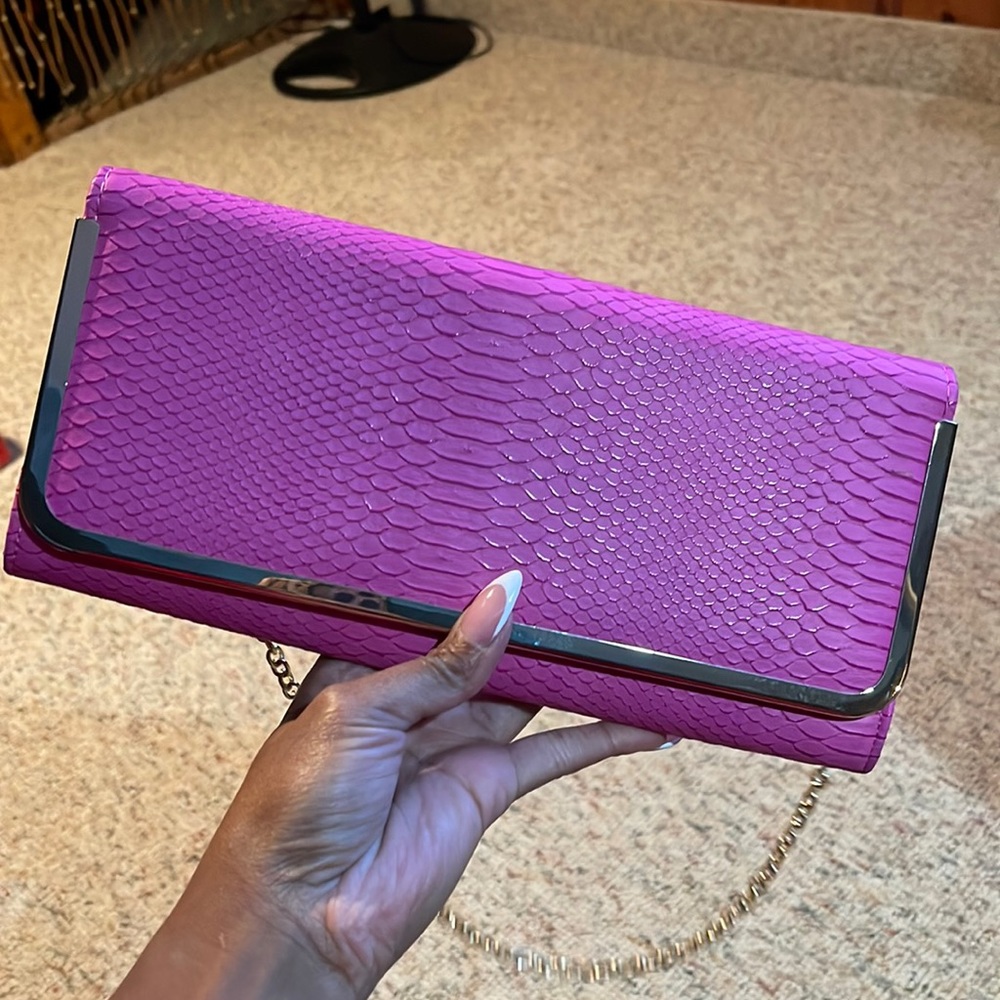 Pink aldo clutch with gold chain